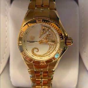TechnoMarine gold cruise watch, seahorse face 🤩